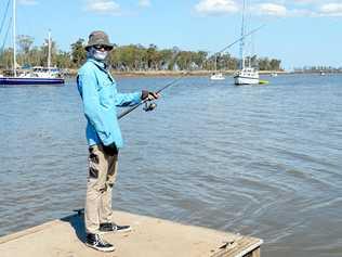 Mark Jenkins from Norman Gardens fishes for blue and king salmon off the southside boat ramp. Picture: Jann Houley