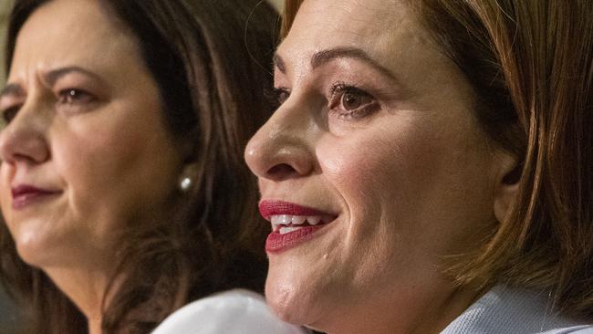 Queensland Premier Annastacia Palaszczuk and Treasurer Jackie Trad (right) speak during the state government's 2019-20 Queensland budget media briefing. Picture: Glenn Hunt/AAP