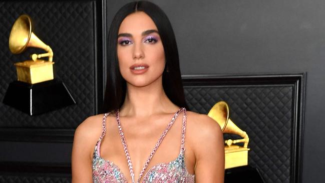 In this handout photo courtesy of The Recording Academy, British singer-songwriter Dua Lipa attends the 63rd Annual Grammy Awards at Los Angeles Convention Center in Los Angeles on March 14, 2021. (Photo by Kevin Mazur / The Recording Academy / AFP) / RESTRICTED TO EDITORIAL USE - MANDATORY CREDIT "AFP PHOTO / Kevin MAZUR / The Recording Academy via Getty Images" - NO MARKETING - NO ADVERTISING CAMPAIGNS - DISTRIBUTED AS A SERVICE TO CLIENTS