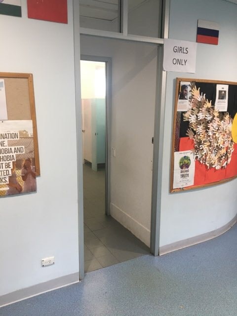 Girls only … but the cubicles inside the Golden Grove High School toilets are visible from halls after external doors were removed. Picture: Supplied