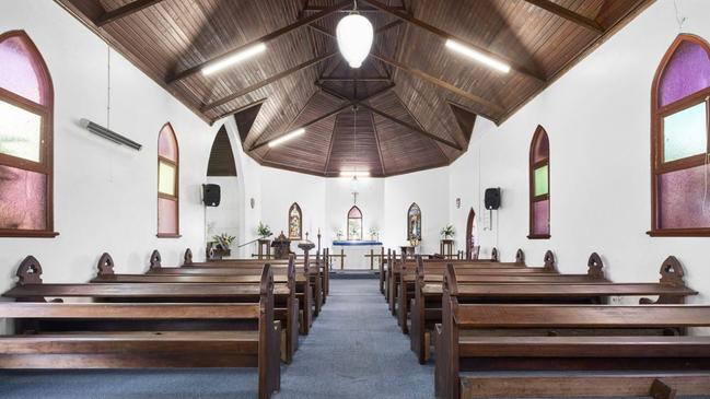 The grand interior of the Prince of Peace Church.