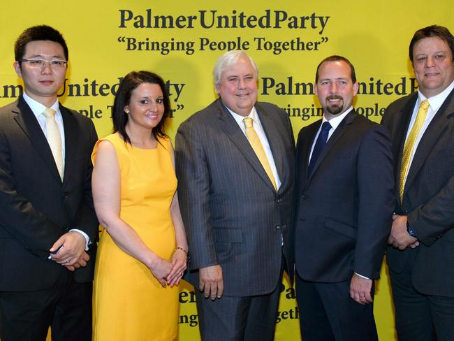 Leader of the Palmer United Party Clive Palmer (C) poses with his PUP senators Dio Wang (L), Jacqui Lambie and Glenn Lazarus (R) along with Australian Motoring Enthusiast Party (AMEP) senator Ricky Muir. Picture: William West