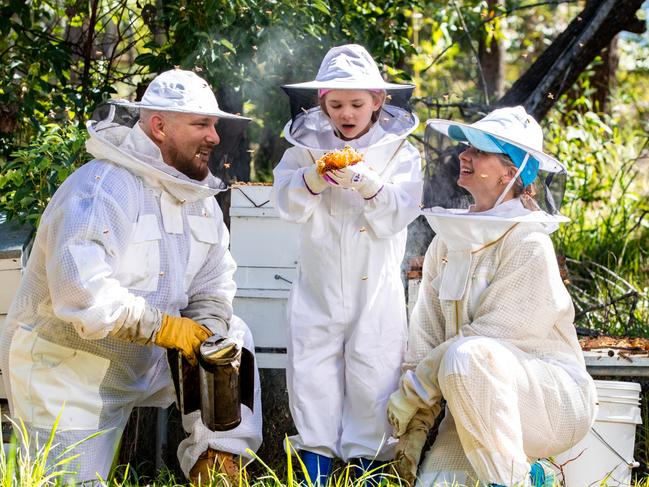 Natasha Roebig and her husband Jason with their daughter Miranda in Queensland. Picture: Supplied