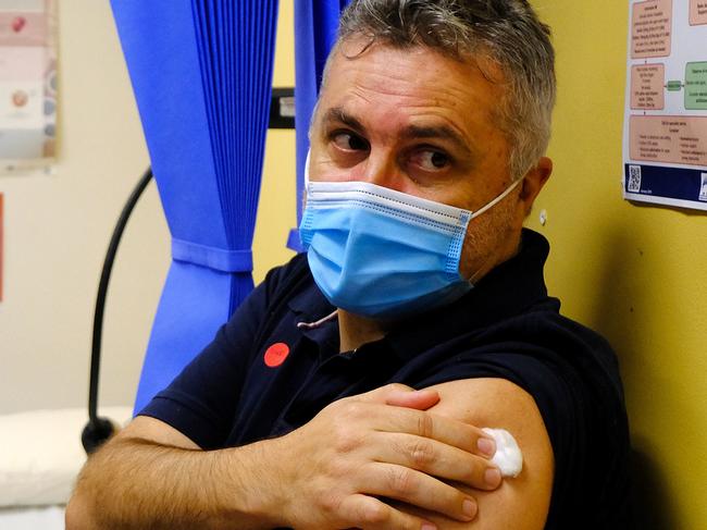 MELBOURNE , AUSTRALIA - NewsWire Photos  MARCH 22: Michael Graham, CEO Victoria Aboriginal Health Services, receiving his COVID19 vaccination at the  (Victorian Aboriginal Health Service) Respiratory Clinic in Fitzroy.Picture: NCA NewsWire/ Luis Ascui