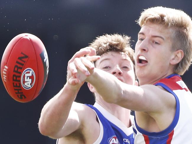 Nick Bryan taps the ball to advantage. Picture: Daniel Pockett/AFL Photos/Getty Images