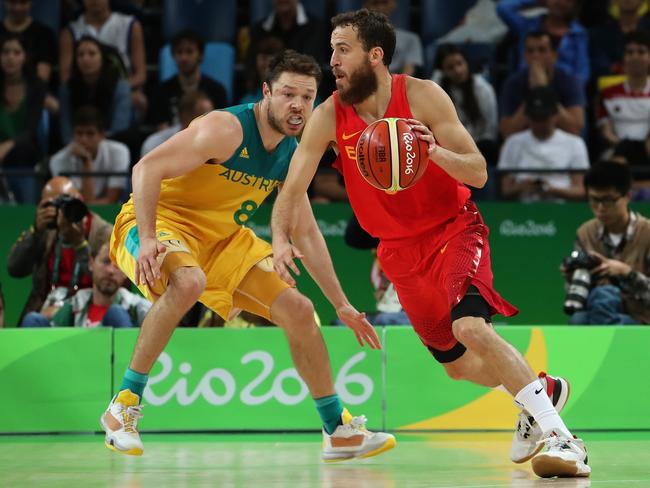 Sergio Rodriguez of Spain drives to the basket against Matthew Dellavedova of Australia.