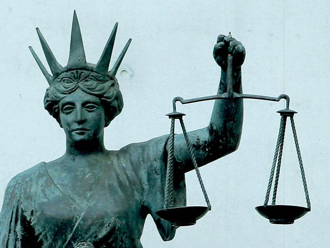 Themis (scales of justice) statue outside the the new Supreme and District Courts, Roma St, Brisbane. Pic Mark Cranitch.