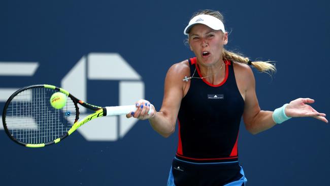 NEW YORK, NY — AUGUST 28: Caroline Wozniacki of Denmark returns the ball during her women's singles first round match against Samantha Stosur of Australia on Day Two of the 2018 US Open at the USTA Billie Jean King National Tennis Center on August 28, 2018 in the Flushing neighbourhood of the Queens borough of New York City. (Photo by Al Bello/Getty Images)