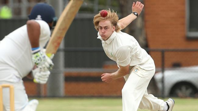 VTCA: Max Buck of Spotswood bowling. Picture: Hamish Blair