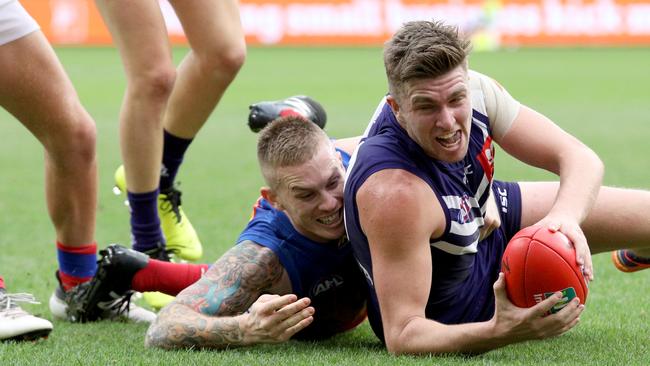 Dayne Beams tackles Brady Grey as the Lions flexed their muscles. Pic: AAP