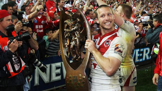 Winners are grinners. Ben Hornby celebrates his 2010 Grand Final triumph over the Sydney Roosters.