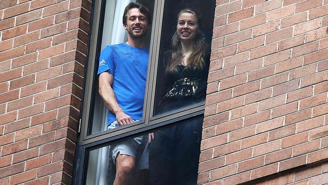 John Millman and girlfriend Fee Maeueler in quarantine at the Sofitel Wentworth in Sydney on Sunday. Picture: Jane Dempster