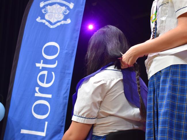 Year 12 students at Loreto College 'Rocked the Chop' for the Cancer Council's Ponytail Project.