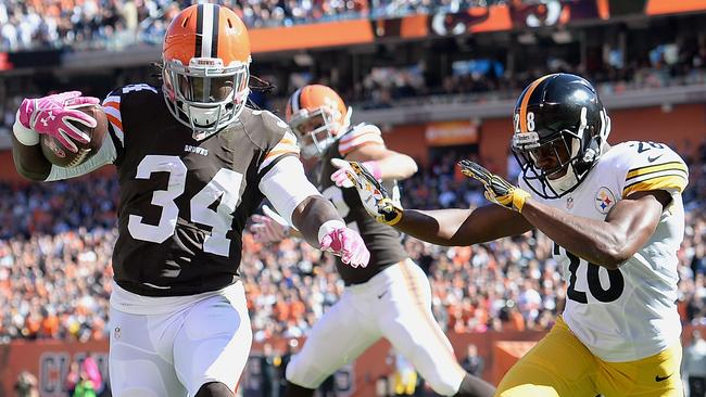 Isaiah Crowell carries the ball for a touchdown.