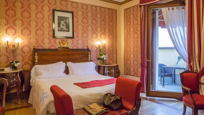 A grande deluxe room at Verona’s Due Torri Hotel.