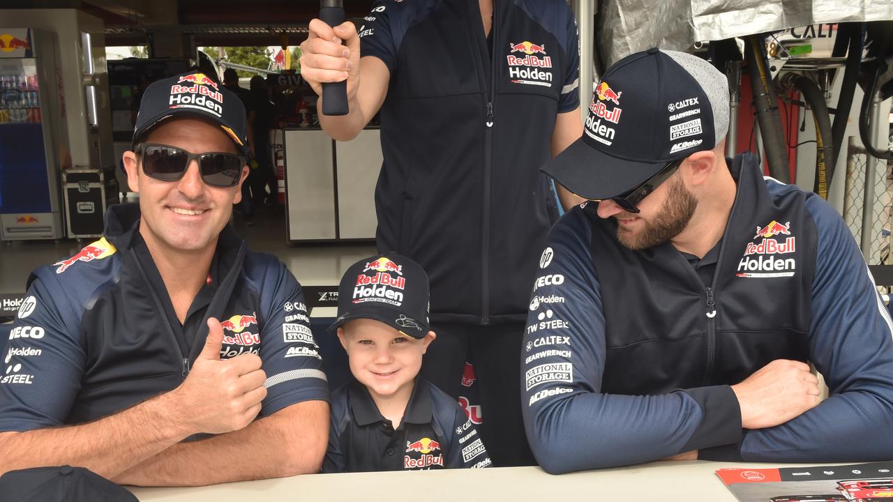 Watpac Townsville 400 Day One. Socials. Supercar drivers Jamie Whincup and Shane Van Gisbergen with Sam Asquith, 3, from Kirwan. Picture: Evan Morgan