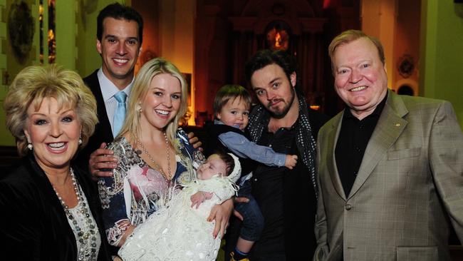 Patti, Matt Welsh, Lauren holding baby Eva, Matthew holding nephew Sam and Bert at Eva’s christening.