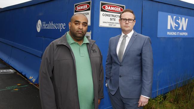 Resident Preyesh Odhavjee with LJ Hooker French's Forrest real estate agent Shane Broekman near the hospital site. They’re among locals awaiting rezoning news.