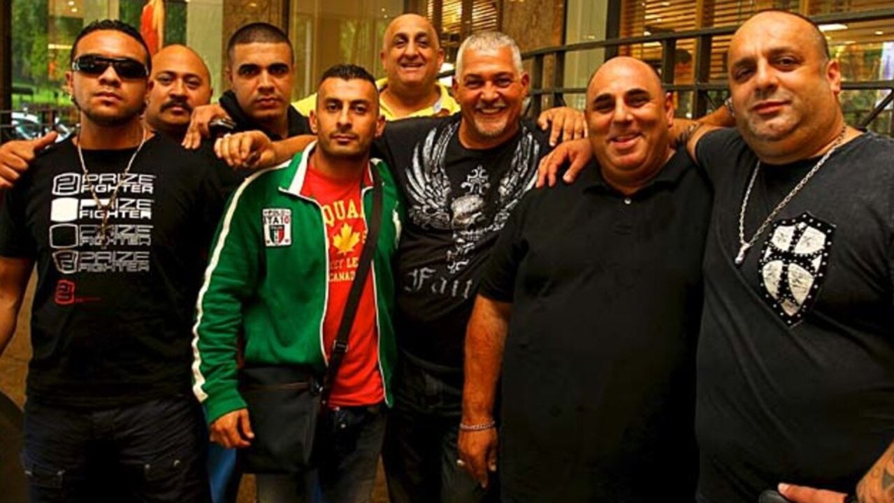 Mick Gatto is in the middle with the black t-shirt with the eagle on the front. Alex ‘Little Al’ Taouil has the green jacket. Ray Younan, in yellow at the back. Picture: Anthony Johnston