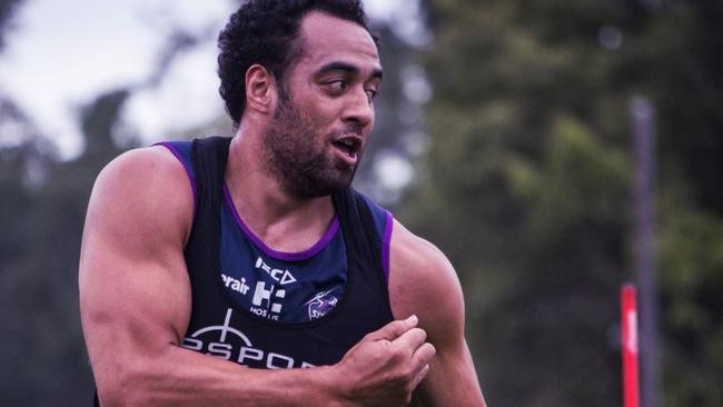 A slim looking Sam Kasiano throws a pass at training. Picture courtesy of Melbourne Storm.