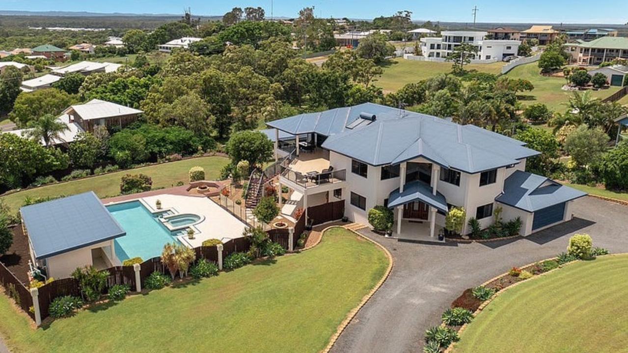 This Urraween home is perfectly designed for entertaining, with a saltwater swimming pool, a theatre room, a large balcony and ocean views overlooking Hervey Bay all the way to Fraser Island.