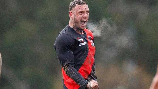 Justin Van Unen celebrates as his 1000th goal sails through on Saturday. Picture: Field of View Photography