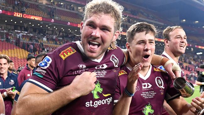 BRISBANE, AUSTRALIA - MAY 08: Angus Scott-Young and Joshua Flook of the Reds celebrate victory after the Super RugbyAU Final match between the Queensland Reds and the ACT Brumbies at Suncorp Stadium, on May 08, 2021, in Brisbane, Australia. (Photo by Bradley Kanaris/Getty Images)