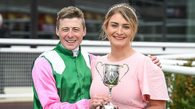 Harry Coffey and stable representative Chloe Cumming celebrate the win of Positivity. Picture: Reg Ryan/Racing Photos via Getty Images