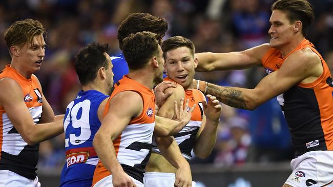 Bulldogs players remonstrate with Toby Greene in 2017 after his boot incident with Luke Dahlhaus. Picture: Getty Images