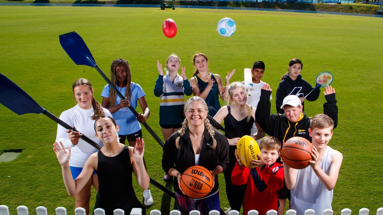 Kids in different sport codes, for body shaming story – Taryn Brumfitt, with kids from different sporting codes. Picture: Matt Turner.