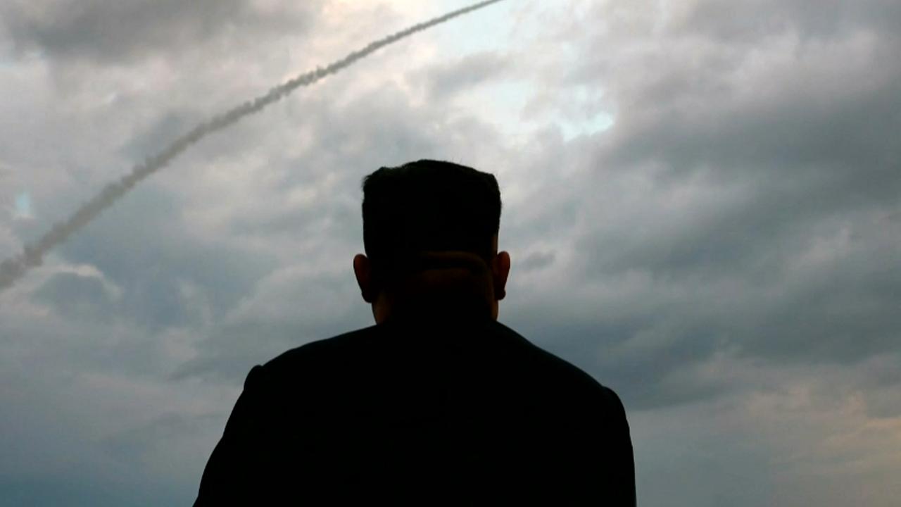 Kim Jong-un watches the launch of a ballistic missile at an unknown location in North Korea in 2019. Picture: Handout/KCTV/AFP