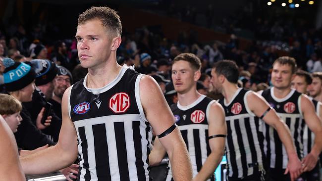 ADELAIDE, AUSTRALIA - AUG 17: Dan Houston of the Power with fans after the win during the 2024 AFL Round 23 match between the port Adelaide Power and the Adelaide Crows at Adelaide Oval on August 17, 2024 in Adelaide, Australia. (Photo by Sarah Reed/AFL Photos via Getty Images)