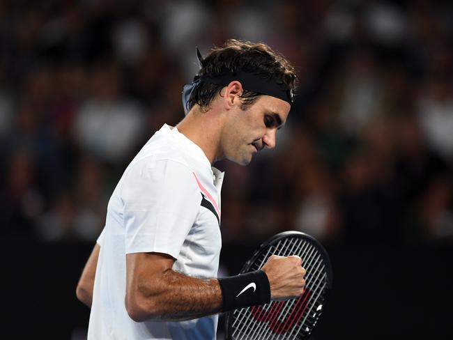 Federer celebrates holding serve in the second set.