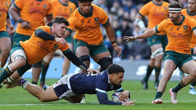 EDINBURGH, SCOTLAND - NOVEMBER 24:  Sione Tuipulotu of Scotland scores their first try during the Autumn Nations Series 2024 match between Scotland and Australia at Scottish Gas Murrayfield on November 24, 2024 in Edinburgh, Scotland. (Photo by David Rogers/Getty Images)