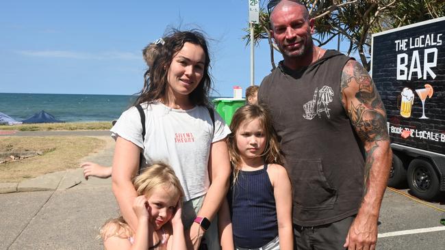 Alaska, 5, Hannah, Violet, 8, and Scott Gardiner at the Mooloolaba Foreshore Festival. Picture: Tegan Annett