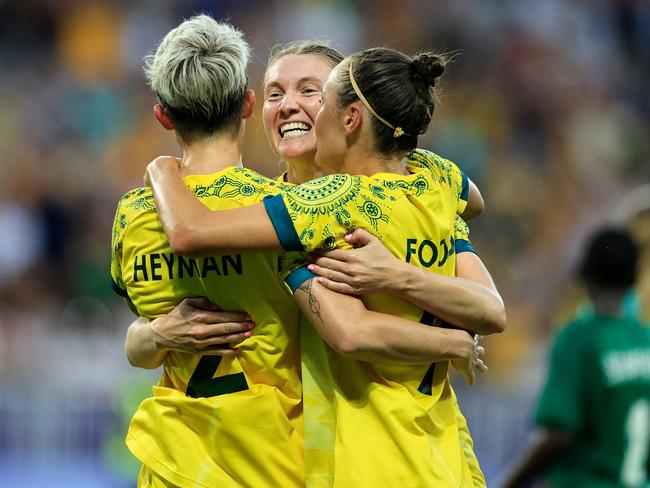 Michelle Heyman celebrates scoring the winner with her Matlidas teammates. Picture: AFP