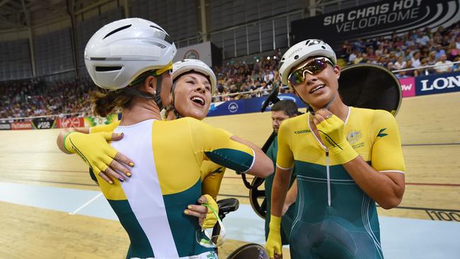Australia's Annette Edmondson celebrates with teammates Amy Cure and Melissa Hoskins after winning gold at the Glasgow Commonwealth Games in 2014. Photo: AAP Image/Tracey Nearmy.