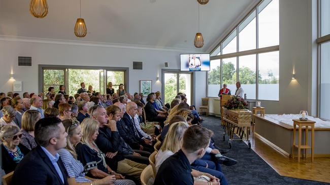 The large crowd gathered for the service in memory of John Burton at the Somerville Chapel at Allambe Memorial Park in Nerang. Picture: Jerad Williams