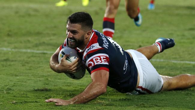 James Tedesco of the Roosters scores a try during the NRL pre-season match against the Sea Eagles.