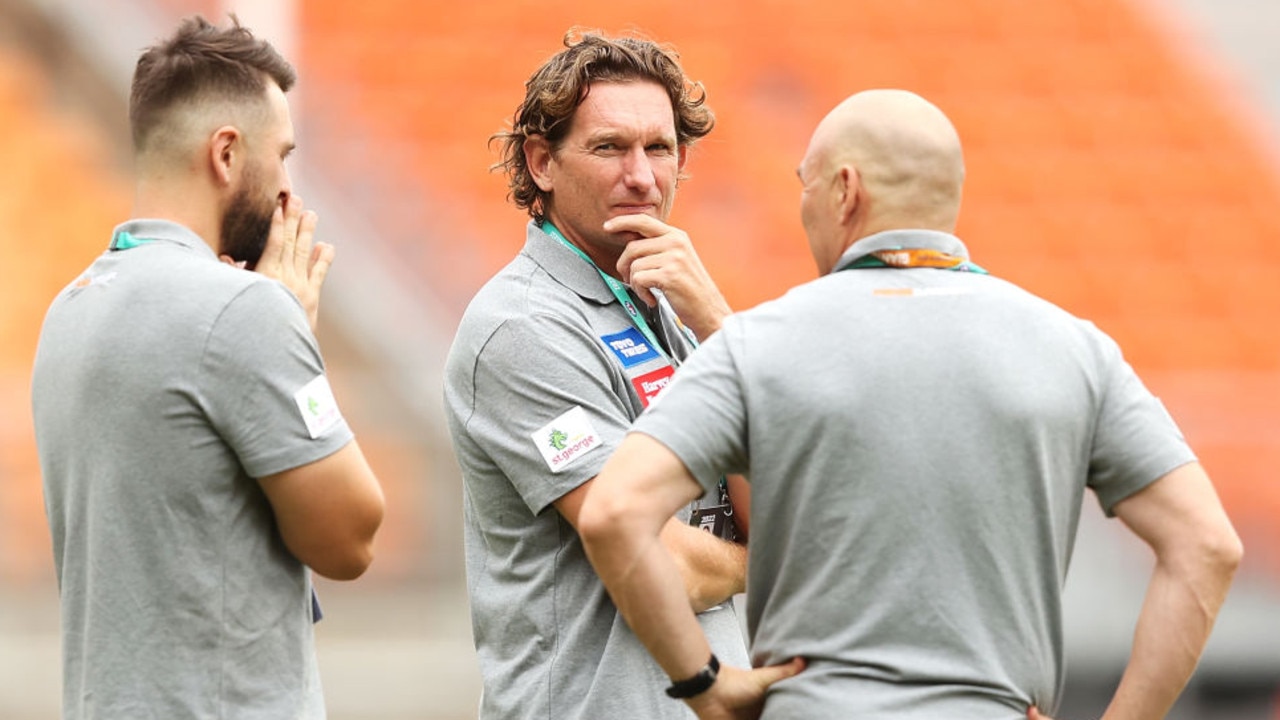 SYDNEY, AUSTRALIA - MARCH 06: Giants leadership advisor James Hird speaks to other members of staff on field before the AFL AAMI Community Series match between the Greater Western Sydney Giants and the Collingwood Magpies at GIANTS Stadium on March 06, 2022 in Sydney, Australia. (Photo by Mark Kolbe/Getty Images)