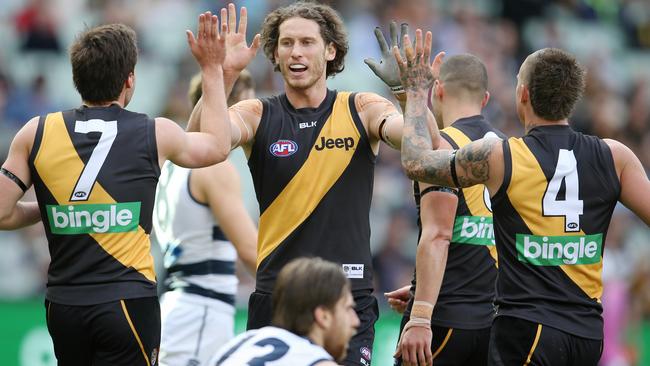 Ty Vickery celebrates a goal with teammates against Geelong. Picture: Michael Klein