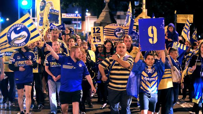 Eels fans march to the ground ahead of the clash with the Rabbitohs. Picture: Mark Evans