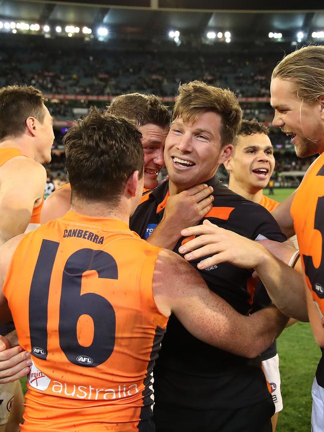 Toby Greene celebrates with teammates. Picture: Phil Hillyard