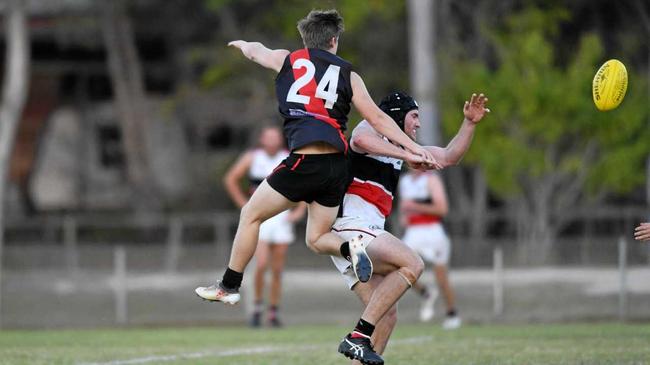 DRESS REHEARSAL: Jay Andrew spoils the mark of Brothers Bulldogs Jack Sickerdick. Picture: Cody Fox