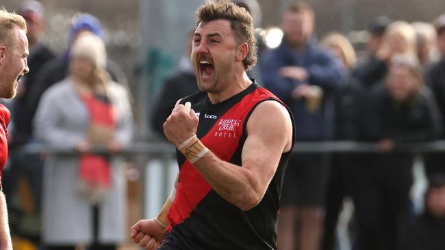 RDFL grand final: Riddell v Diggers Rest: Dylan Tarczon of Riddell (R) celebrates a goal on Sunday September 11th, 2022, in Romsey, Victoria, Australia.Photo: Hamish Blair