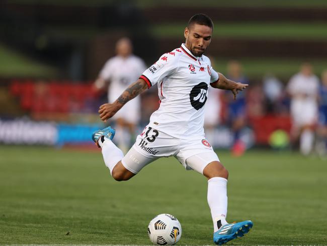 NEWCASTLE, AUSTRALIA - JANUARY 08: Tate Russell of the Wanderers kicks the ball during the A-League match between the Newcastle Jets and the Western Sydney Wanderers at McDonald Jones Stadium, on January 08, 2021, in Newcastle, Australia. (Photo by Ashley Feder/Getty Images)