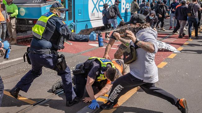 Ugly scenes as police attempt to stop protesters gathering in the city. Picture: Jason Edwards