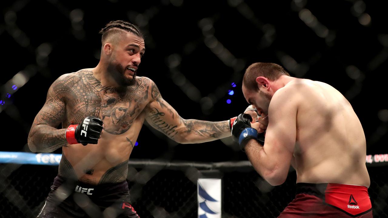 Tyson Pedro lands on Saparbek Safarov at UFC 221. Picture: AAP Image