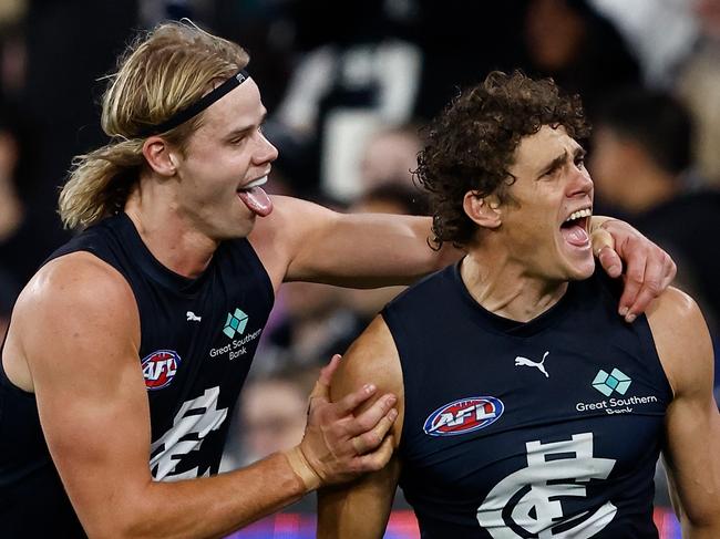 MELBOURNE, AUSTRALIA - APRIL 27: Tom De Koning (left) and Charlie Curnow of the Blues celebrate during the 2024 AFL Round 07 match between the Geelong Cats and the Carlton Blues at the Melbourne Cricket Ground on April 27, 2024 in Melbourne, Australia. (Photo by Michael Willson/AFL Photos via Getty Images)