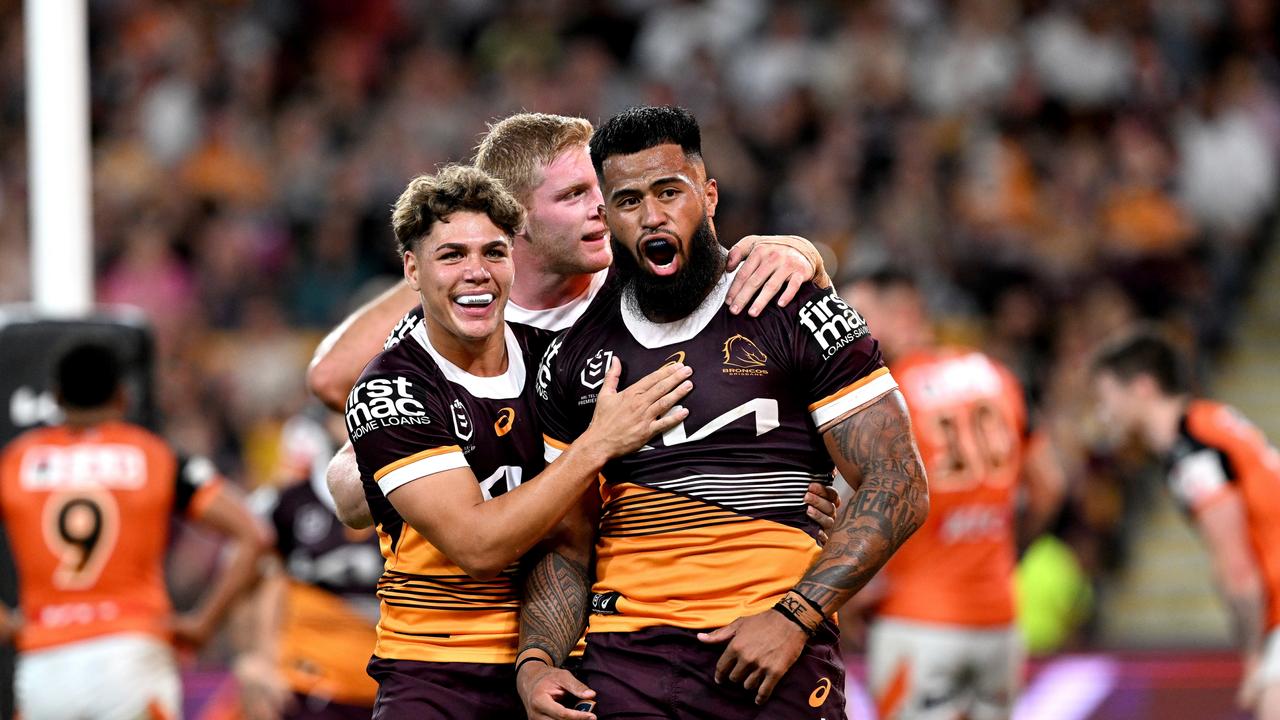 Jordan Riki of the Broncos scores a try during the NRL Round 5